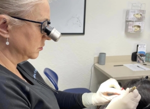 Dr Kelemen during one of her SOLO hair transplant sessions.